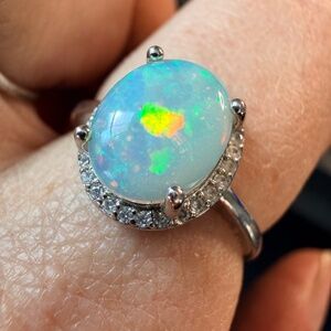 2.4 carat Ethiopian opal adjustable ring with pinfire and confetti pattern